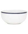 Named for a trendy Copenhagen neighborhood but designed with timeless style, the Christianshavn Blue all-purpose bowl features a double band of navy in pristine white porcelain. From Dansk.