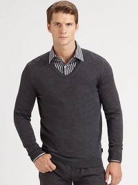 Slim-fit extra-fine merino wool sweater with contrast color detail at inside collar trim.V-neckRibbed knit cuffs and hemWoolDry cleanImported