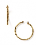 These braided hoop earrings from Lauren Ralph Lauren are the perfect complement to this season's nautical styles.