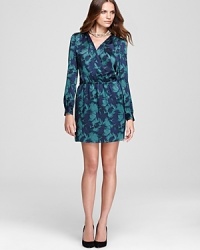 Vibrant palms splay across the fluid silhouette of this DKNYC dress for a fashionable forecast ahead.