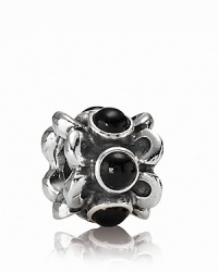 A ring of sterling silver flowers is punctuated with elegant onyx stones. Charm by PANDORA.