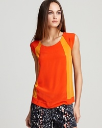 Fiery hues set this French Connection top aflame for a haute look this season. Let the color blocking take center stage and pair the piece with a classic bootcut jean.