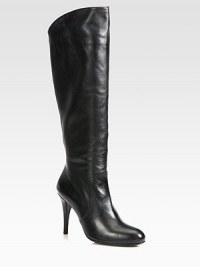 Sleek, soft nappa leather knee-high is given the added comfort of a stretch back inset for a perfect fit.Self-covered heel, 2¾ (65mm)Shaft, 14½Leg circumference, 13Leather upperLeather liningPadded insoleExclusive flexible rubber soleMade in Spain