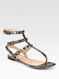 A go-to favorite in lustrous metallic leather with signature metal studs and adjustable ankle straps. Metallic leather upper with metal studsAdjustable ankle strapsLeather lining and solePadded insoleMade in Italy