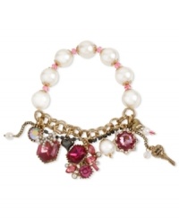 Betsey Johnson's half-stretch bracelet features gold tone bracelet chains, hematite tone crystal cup chain accent, glass pearl and pink faceted bead stretch chain, fuchsia-colored crystal gems, hematite and gold tone bubble hears and round crystal accent. Set in gold tone mixed metal. Approximate length: 7-1/2 inches.