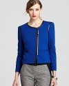 Infuse your 9-to-5 style with sharp edge as faux-leather trim accentuates a sculptural VINCE CAMUTO jacket.