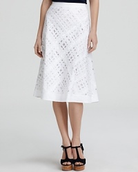 Touting unexpected cut-outs and a delicate ribbon weave, this Lafayette 148 New York skirt perks up your style with playful details.