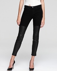 Then ultimate look for the woman torn between denim and leather, these stylishly two-faced J Brand jeans flaunt chic leather panels and a skinny fit in flattering dark wash denim for the best of both worlds.