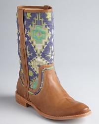 Weave new tales in these tapestry boots from Ella Moss. Mixed media in leather and tribal fabric, they are right, right now, but so unique you can wear them forever.