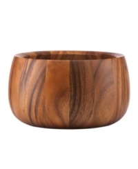 Less is more with Dansk wood serveware and serving dishes. Panels of rich acacia are forged together in this collection of ultra-smooth, simply beautiful Tulip salad bowls, a natural choice when it comes to serving fresh, healthy meals.