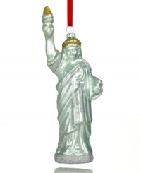 Take a piece of the big city wherever you're headed this holiday with a molded glass ornament depicting New York's Statue of Liberty.