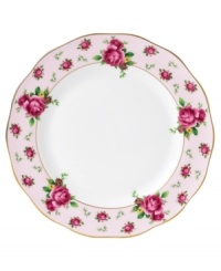 Revive a classic dinnerware pattern with the Vintage dinner plate. Lush blossoms plucked from Royal Doulton's Old Country Roses collection flower on pink bone china with a ruffled gold edge.