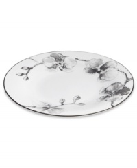 Compose a striking arrangement with the Black Orchid tidbit plate by Michael Aram. Fine white Limoges porcelain flourishes under a dark watercolor motif inspired by foliage from around the world.