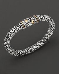 From the Naga collection, a woven chain bracelet, designed by John Hardy.