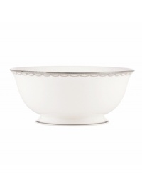 Sturdy bone china draped in a delicate platinum garland makes the Iced Pirouette serving bowl by Lenox a flawless go-to for formal entrees.