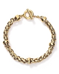 Lauren Ralph Lauren's shining woven chain bracelet is sure to a beloved go-to accent.