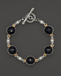 Faceted black onyx and pearls lend statement style to this sterling silver and 18K gold bracelet. From Konstantino.