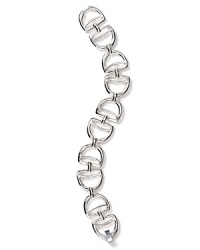 Horsebit links lend equestrian chic to this classic bracelet from Lauren Ralph Lauren.