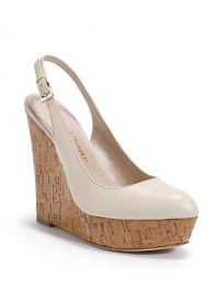 THE LOOKAlmond toeLeather upperAdjustable slingback strapPadded insoleCork wedge, 5 (125mm)Cork platform, 1 (25mm)Compares to a 4 heel (100mm)THE MATERIALLeather upperLeather lining and soleORIGINImported