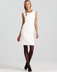 With winter whites all the rage, this T Tahari dress refreshes your cocktail style with a crisp sheath silhouette. The clean slate begs for statement jewels and sheer tights.