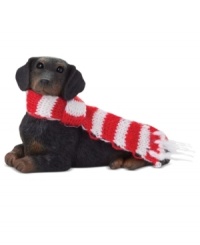 Bark up the right tree with a Christmas ornament for your dog – or a fellow animal lover! A cute black dachshund waits patiently for treats, dressed in a festively striped scarf. From Sandicast.