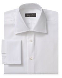 Distinguish yourself in the workplace with a striking solid dress shirt from Canali, crafted in textured cotton for a unique, comfortable hand. Pair with a silk tie for a stellar duo.