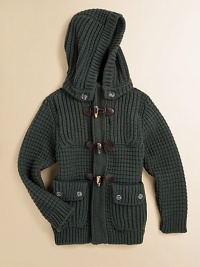 A rustic hip-length layer in a chunky waffle knit with a versatile detachable hood and preppy toggle details.Detachable button hoodRibbed stand collarLong sleeves with ribbed cuffsElbow patch detailFront toggle closureFront patch button pocketsRibbed hem80% wool/20% nylonHand washMade in Italy