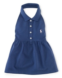 The classic cotton-mesh polo is given a pretty warm-weather look in a sleeveless halter silhouette with smocked detailing.