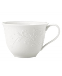 An elegant white-on-white pattern featuring an embossed vine motif and interior glaze lends this Opal Innocence Carved cup to refined dining every day.