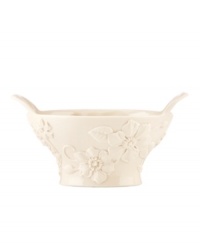 Teeming with fresh blooms in graceful ivory porcelain, the Floral Fields basket from Lenox has a serene, understated elegance. A charming centerpiece, perfect for holding flowers, potpourri or fruit.