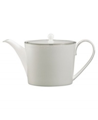 Set a dazzling tea or coffee service with this fine china teapot. From innovative designer Monique Lhullier, it features a raised dot pattern tipped with platinum for a burst of sophisticated charm.