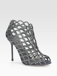 Light-catching Swarovski crystals adorn this modern cage silhouette rendered in soft Italian suede. Self-covered heel, 4¼ (110mm)Swarovski crystal-coated suede upperPeep toeBack zipLeather lining and solePadded insoleMade in Italy