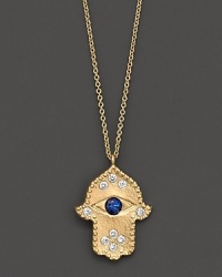 Sparkling diamonds and a sapphire eye watch over you. Set in 14K gold Hamsa pendant.