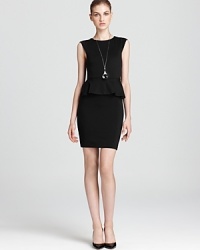 Flirty peplum skirts ruled the runway all season and this Alice + Olivia dress masters the trend with pure ladylike charm.