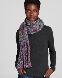 For supreme warmth and style, wrap up in UGG® Australia's chunky, space dyed scarf with long, twisted fringe edges.