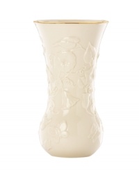 Morning glories spring from ivory porcelain, giving this Lenox Floral Meadow vase a delightfully understated grace. A band of sumptuous gold adds to its classic allure.