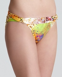 Get wild with PilyQ's abstract animal printed bikini, dressed up with polished, gold-tone hardware.