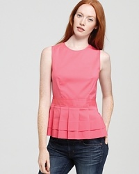 Classic pleats and an on-trend peplum waist catapult this pretty, polished Theory top to a new stratosphere of chic.