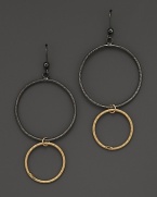 Striking, elegant hoops of black and yellow gold. By Lana.