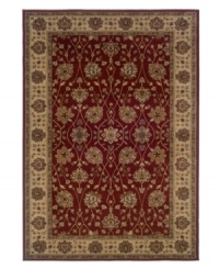 A lush, naturalistic motif teeming with beautifully detailed palmettes and meandering vines infuses your home with old-world sophistication. Woven from super soft polypropylene for superior stain resistance and durability, this magnificent area rug from Sphinx will maintain its lush texture and rich coloration for years to come. (Clearance)