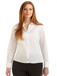 THE LOOKA shapely classic in a lightweight cotton blendPoint collarButton placketShapely front and back dartsLong sleeves with button French cuffsBack yokeTHE FITAbout 25¼ from shoulder to hemTHE MATERIAL68% cotton/30% nylon/2% elastaneCARE & ORIGINHand washImported