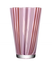 With a retro feel and stripes of pretty purple hues, the beach-inspired Cabana vase brightens any space with irresistible style. Designed by Ludvig Lofgren for Kosta Boda.