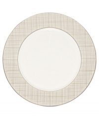 Dressed in a fine diamond grid of bronze and warm taupe, the Veneto dinner plates are tailored for formal dining and everyday elegance in bone china.