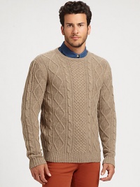 Made from cozy lamb's wool, a classic cable-knit sweater with a modern fit. CrewneckPulloverRibbed trimWoolDry cleanImported