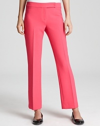 Classy work pants get a pop of personality thanks to a bright pink makeover! Rock these Milly pants to brighten any day at the office.