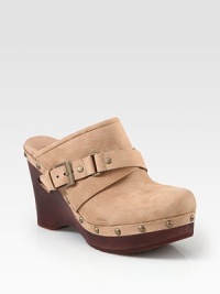 A retro-inspired suede favorite with edgy metal studs, an adjustable buckle strap and powerful wooden wedge. Wooden wedge, 4 (100mm)Wooden platform, 1¼ (30mm)Compares to a 2¾ heel (70mm)Suede upper with metal studsAdjustable buckle strapLeather liningRubber solePadded insoleImported