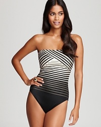 Optical stripes lend this Gottex bandeau swimsuit graphic, high-fashion appeal-but the best part is how incredibly flattering the pattern makes this must-have.