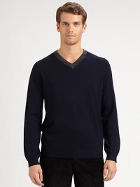 A smart v-neck sweater updated with ribbed detailing and standout contrast trim.V-neck with contrast ribbed trimLong sleeves with ribbed cuffsRibbed hemMerino woolHand wash or dry cleanImported