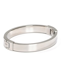 A subtle touch of shine, MICHAEL Michel Kors' sliver bangle defines versatile. Wear the shapely hinged style to add a silvery polish to any outfit.