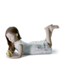 A little girl plays mother hen to a fuzzy yellow chick in a Lladro figurine that's undeniably sweet. A special gift for young ladies and cute addition to any porcelain collection.